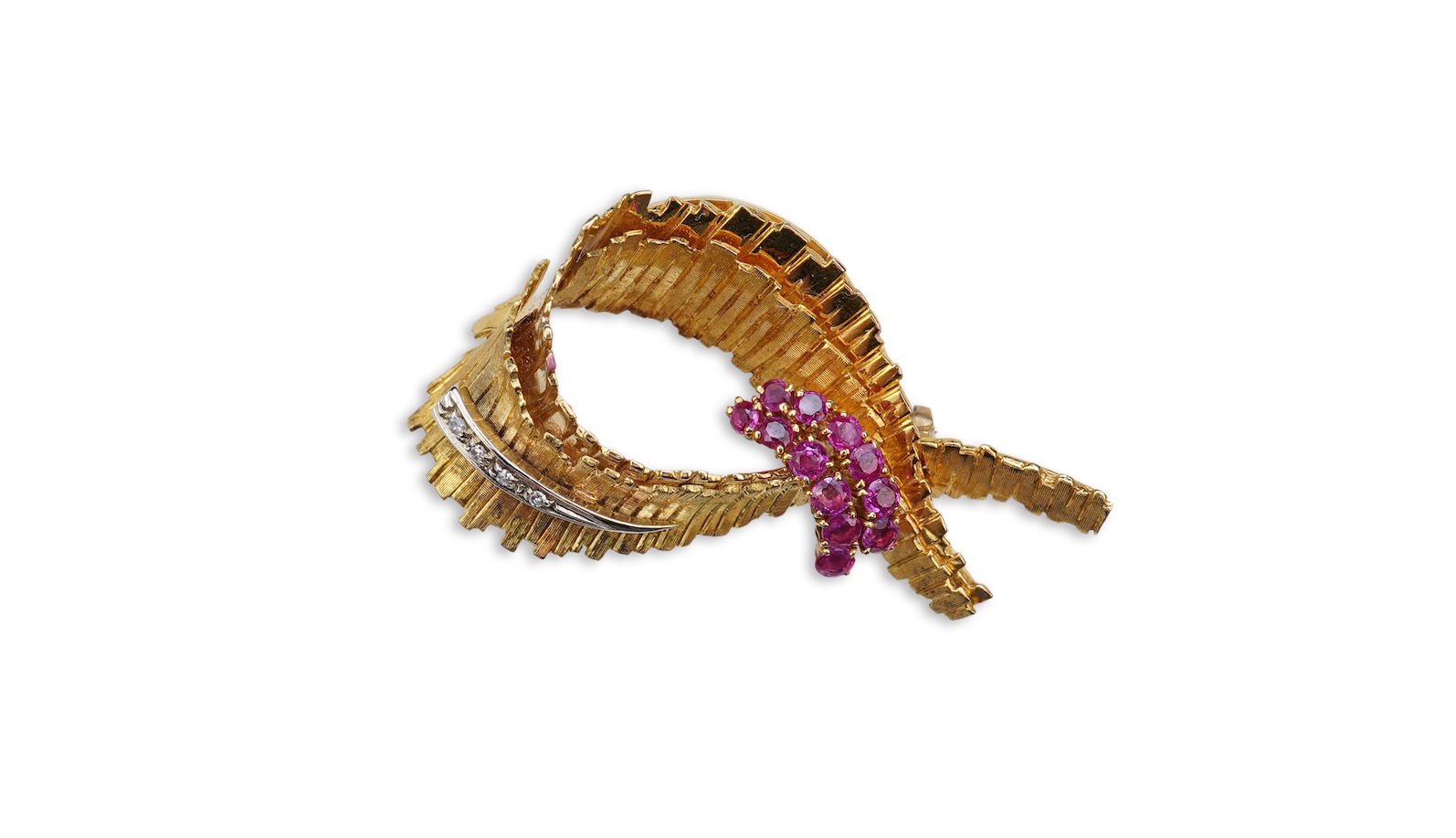 A gold, ruby and diamond brooch, circa 1965